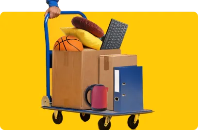 Image of student removals represented by a trolley with boxes of student home items